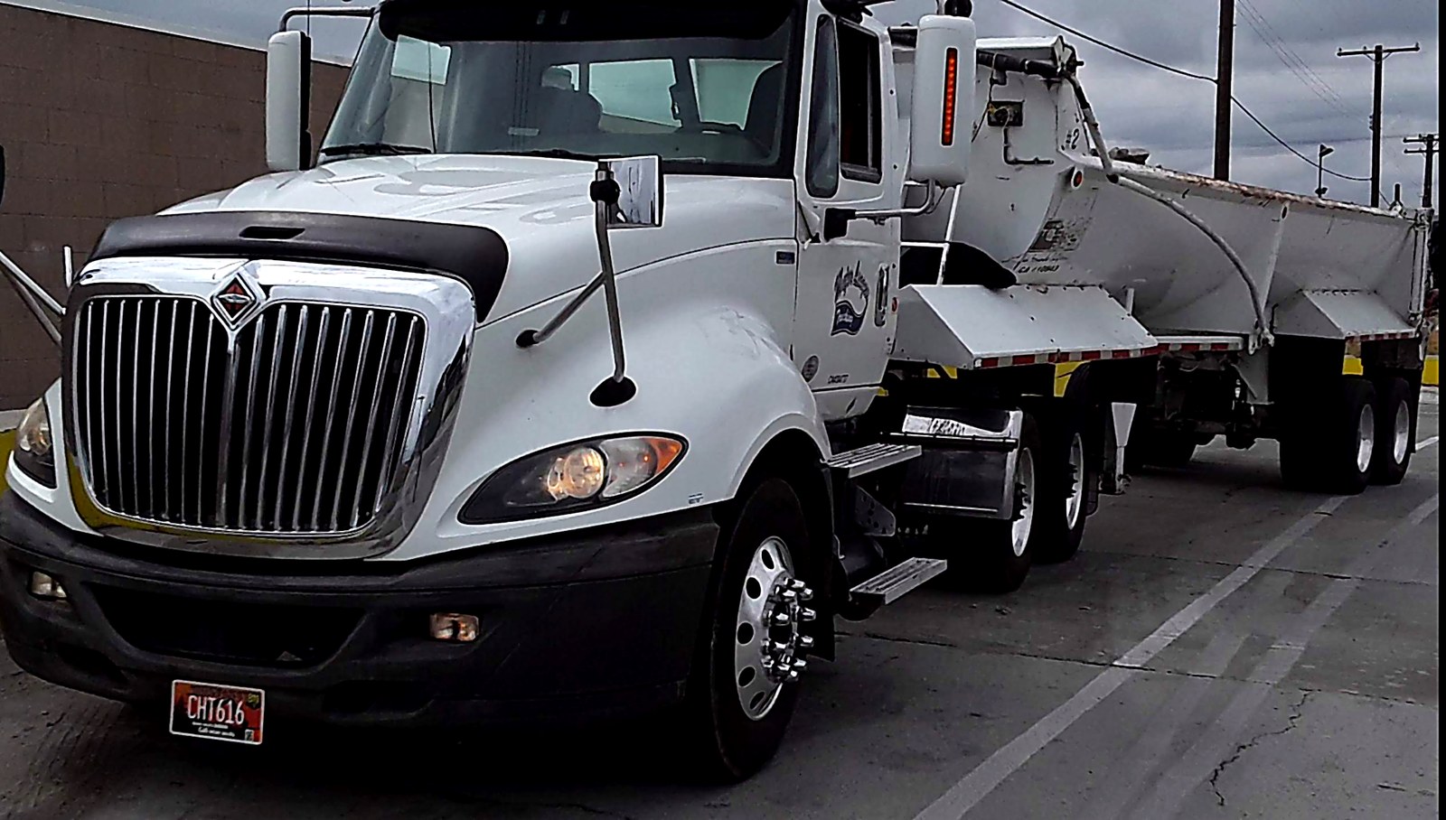 Red dump truck on jobsite