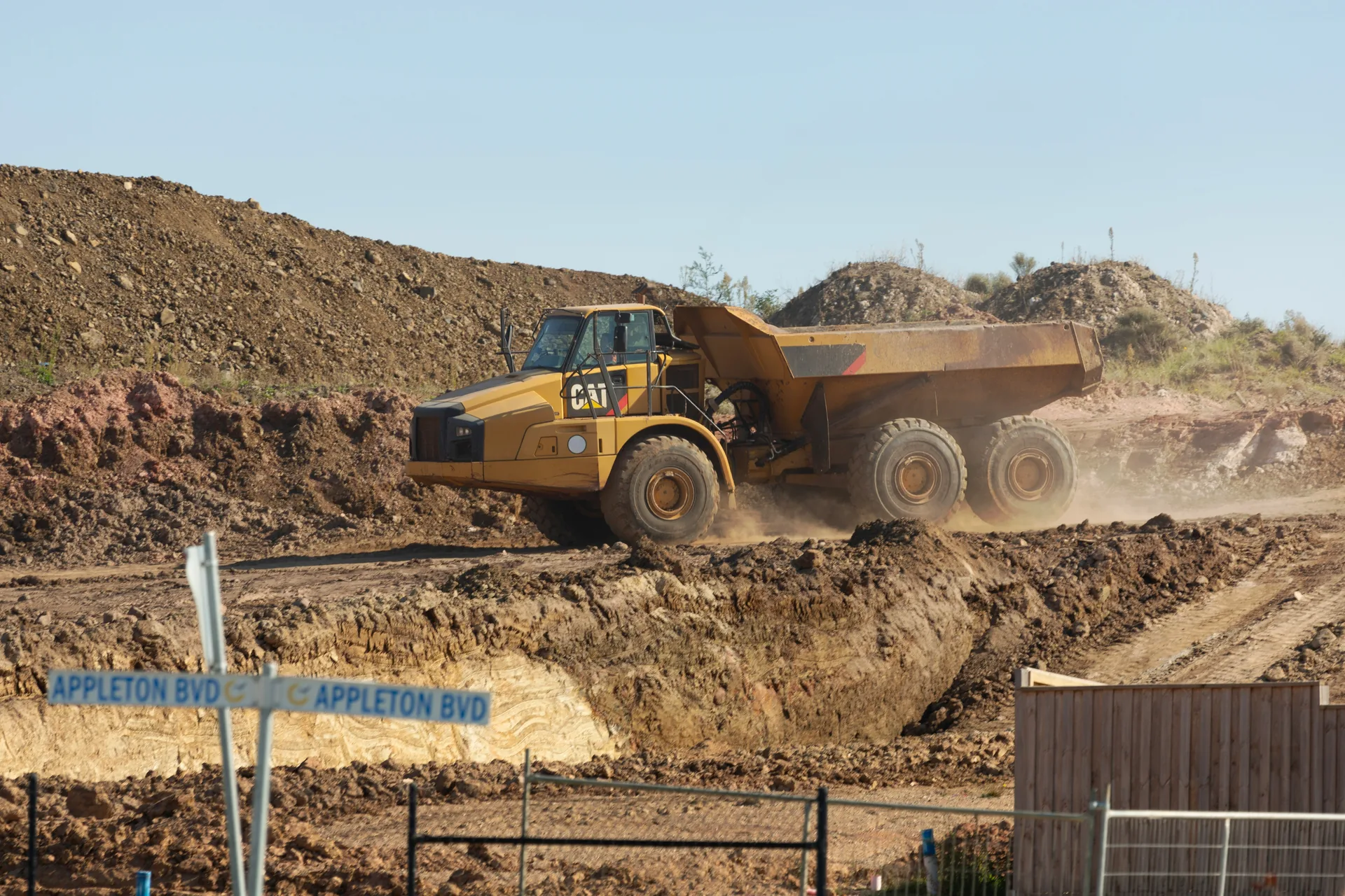 Dump trucks on a construction jobsite
